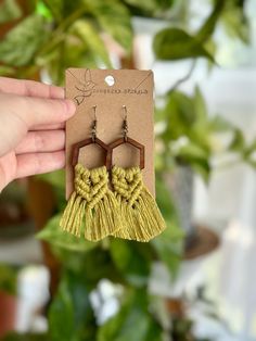 Get your free-spirit boho vibe on with these fun handmade macrame fringe earrings!  These bohemian earrings were carefully hand knotted using soft recycled cotton cord on a wood piece. These dangle earrings are very lightweight. Makes the perfect gift for the hippie girl in your life.  Handmade with love in the USA.  *Nickel free earrings. Handmade with eco-friendly materials! I use high quality cord made from recycled cotton.  ** Attention local buyers ** If you prefer to arrange for in-person pick up instead of having your item shipped to you, please message me after placing your order and I can refund any shipping costs where applicable. Macrame Earrings, wood earrings, bohemian jewelry earrings, boho jewelry for women, boho earrings dangle, fringe earrings, hippie jewelry, gifts for wo Bohemian Adjustable Macrame Tassel Earrings, Adjustable Brown Bohemian Tassel Earrings, Brown Bohemian Tassel Earrings For Summer, Bohemian Brown Tassel Earrings For Summer, Bohemian Macrame Jewelry For Crafting, Brown Bohemian Tassel Earrings, Bohemian Brown Tassel Earrings, Bohemian Macrame Tassel Dangle Earrings, Bohemian Macrame Tassel Earrings