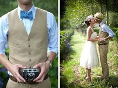 a man and woman standing next to each other in front of trees holding an old camera