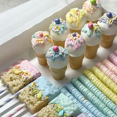 an assortment of ice cream treats and candy bars