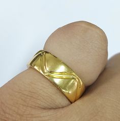 -PRODUCT TYPE - GOLD VERMEIL SOLID RING -MATERIAL - SILVER -PURITY - 925 SILVER -TOTAL GRAM WEIGHT - 7.360 GRAMS -BAND WIDTH - 7 MM GOLD VERMEIL RING : This is one of the best ring from our Statement collection. We have made this in 925 silver with great finishing. This ring gives royal touch. We bet! You won't regret after placing an order with us. Cheers and have a nice day! Anirudh Gems Store :- https://www.etsy.com/uk/shop/ANIRUDHGEMSStore?ref=search_shop_redirect -Quality is guaranteed. Our Gold Thick Band Couple Promise Rings, Hallmarked Round Band Gold Couple Rings, Gold Polished Couple Rings, Best Ring, Gem Store, Beautiful Flower Designs, Flower Band, Gold Vermeil Jewelry, Vermeil Jewelry