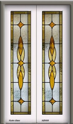 two stained glass doors with decorative designs on them