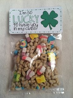 a bag filled with lucky charms next to a sign that says i'm so lucky to have you in my class