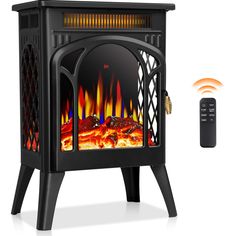 an electric stove with flames and remote control