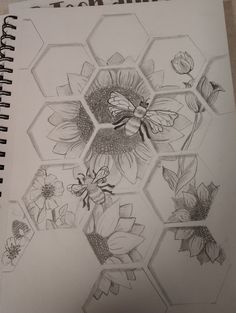 a drawing of some flowers and bees on a sheet of paper