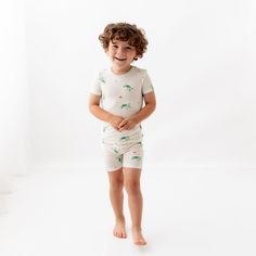 Our toddler pajama sets are breathable, super soft, and wildly comfy. Each set comes with a short-sleeved top and matching shorts made with luxurious, eco-friendly viscose from bamboo fabric for all-over comfort without the negative environmental impact. Wash before first use Machine wash cold, gentle cycle Tumble dry low Iron low if desired Do not bleach 95% Viscose from bamboo, 5% Spandex No tag for extra comfort