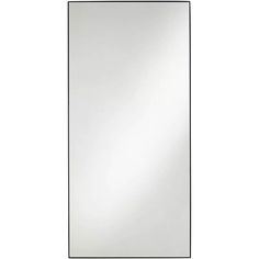 a large white mirror on top of a wall