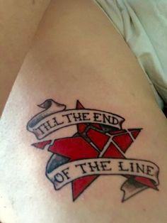 a tattoo that reads tell the end of the line