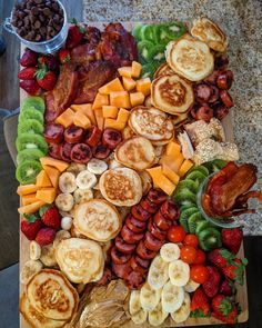 a platter filled with lots of different types of food