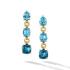 A celebration of color and natural beauty, inspired by the sunsets of Costa del Sol. Contemporary faceting techniques borrowed from traditional antique cuts highlight the vibrant depth of each stone in these David Yurman earrings. 18-karat yellow gold Blue topaz and Hampton blue topaz, 16.80 total carat weight Stones, 8.3-10.1mm Earring drop length, 51mm Style #: E18124 88ABTIB Luxury Blue Topaz Gemstone Jewelry, Aquamarine Earrings Drop, David Yurman Earrings, Blue Jewellery, Blue Topaz Jewelry, Nice Nails, Earring Drop, Aquamarine Earrings, Blue Topaz Earrings