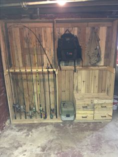 the inside of a garage with fishing gear