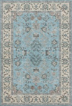 a blue and beige rug with an ornate design