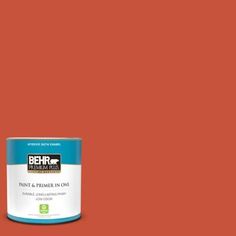 the behr ultra paint is shown in an open, brown tin with no lid