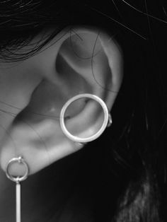 Editor's NotesREINHEART's accessories can be a fashionable point for various casual stylings.- Plane sphere earcuff- Unique and sophisticated style- Elegant and vintage mood- Daily point itemMeasurement (in.)- Diameter: 0.67 in.Composition & Care- 925 silver- It could be discolored by moisture- Keep in a sealed zipper bag- Clean using a silver cleaner or toothpasteDesigner- by REINHEART Modern Open Ring Earrings For Pierced Ears, Classic Pierced Ear Cuff, Modern Round Ear Cuff, Minimalist Single Open Ring Earring, Modern Pierced Round Ear Cuff, Modern Round Single Ear Cuff, Everyday Single Open Ring Earring, Modern Round Ear Cuff For Everyday Wear, Modern Everyday Ear Cuff