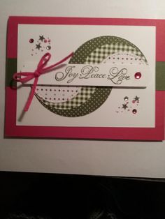 a close up of a greeting card with a ribbon on the front and back of it