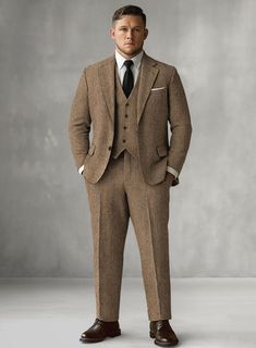 The Irish Brown Herringbone Tweed Suit will become the standard of business dressing and by far the most ubiquitous option. Crafted from wool, the Irish Brown color of the suit will surely influence a veteran dresser to buy the suit for building a sharp wardrobe. Team it up with a matching waistcoat, a white shirt and dark brown derby shoes.  Look Includes  Irish Brown Herringbone Tweed Fabric  Two Button Jacket Style  Notch Lapel  Horn Brown Buttons  Single Vent  Three Cuff Buttons  Two Welted Back Pockets on Trousers    Click 'Customize Now' to modify the look if needed.   Lining: Viscose, Dry Clean. Semi-formal Notch Lapel Tweed Jacket, Formal Tailored Tweed Sport Coat, Tailored Tweed Sport Coat For Formal Occasions, Timeless Tweed Sport Coat For Formal Occasions, Elegant Tweed Three-piece Suit With Notch Lapel, Formal Tweed Blazer With Herringbone Pattern, Formal Tweed Jacket With Welt Pockets, Tailored Tweed Jacket With Herringbone Pattern For Semi-formal, Timeless Business Tweed Jacket With Herringbone Pattern