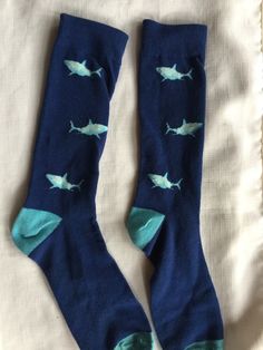 Choice of two pair of large men's novelty socks: Shark socks, I think a size Large, as they measure 9.5" from toe to heel. Never worn! Musician socks, still with tag, also Large. Also, please take a look at my storefront at: https://www.etsy.com/shop/FabFinds42?ref=seller-platform-mcnav I have a wide selection of one-of-a-kind items, from clothing and toys to home decor and gift items, and I add new things almost every day. Fish Socks, Shark Socks, Beach Socks, Mens Novelty Socks, Quirky Girl, Orange Bracelet, Socks Pattern, Blue Socks, Pattern Socks