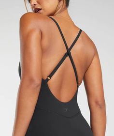 Gymshark Strappy All In One - Black | Gymshark Fitted Nylon Activewear With Straps, Black Strappy Back Sports Bra For Yoga, Fitted Activewear With Adjustable Straps For Light Exercise, Fitted Activewear With Straps For Sportswear, Fitted Sportswear Activewear With Adjustable Straps, Strappy Fitted Activewear For Training, Black High Stretch Activewear With Adjustable Straps, Versatile Gym Activewear With Straps, Fitted Strappy Activewear Sportswear