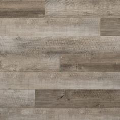 wood flooring that looks like it has been made from different types of planks