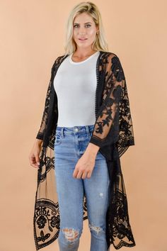 The ever so popular kimono in a stunning lace floral print! We love it's versatility from everything to dresses or laid back vibes with jeans! Open front 3/4 length wide sleeves Front patch pockets Lace construction Approx. 39" length (size S/M) Our model Karin is wearing a S/M Lace Duster Outfit, Black Lace Kimono Outfit, Lace Kimono Outfit, Duster Outfit, Black Lace Kimono, Kimono Outfit, Lace Kimono, Wide Sleeves, Black Floral