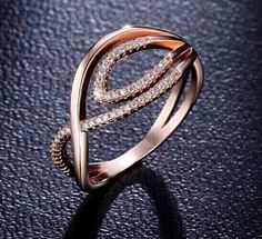 Exquisite Rose Gold Rings For Formal Occasions, Rose Gold Rings With Diamond Accents For Party, Exquisite Rose Gold Rings With Halo Design, Elegant Rose Gold Anniversary Rings, Party Rose Gold Rings With Diamond Accents, Rose Gold Party Rings With Diamond Accents, Elegant Rose Gold Rings For Party, Rose Gold Oval Rings For Party, Elegant Rose Gold Party Rings