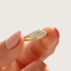 The Diamond Sparkle Ring is a delicate and captivating piece of jewelry designed for women who appreciate elegance and charm. Crafted in 14k solid gold, this signet ring features a bedazzling display of pave-set diamonds that glisten and shimmer with every movement.    The ring can be made with yellow, rose, or white gold, please choose your size from the dropdown menu options above. 𝐑𝐢𝐧𝐠 𝐃𝐞𝐭𝐚𝐢𝐥𝐬: ❥ Solid gold, available in 10, 14 & 18 karats. ❥ Gold Color Options: White Gold, Yellow Pave Signet Ring, Sparkling Rings, Ring Finger, Pinky Ring, Color Dorado, Stacking Rings, Signet Ring, Pave Diamonds, Band Rings