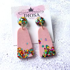 These handmade unique earrings are made of lightweight resin and hypoallergenic stainless-steel backings. Pretty and elegant, these fashion earrings are all you need to look fabulous this season.  Each pair is unique and made in small batches. We don't believe in mass-producing repetitive designs.  Approximately 7 cm long Trendy Pink Glitter Earrings, Modern Pink Jewelry For Party, Modern Pink Party Jewelry, Pink Glitter Earrings, Pink Resin Earrings For Party, Diy Resin Projects, Resin Jewelry Diy, Resin Projects, Earrings Geometric