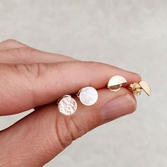 Modern and minimal hammered circle stud earrings. A simple and versatile pair of earrings that can be worn everyday. Available in sterling silver or 14k gold filled. Earring width: 6.4 mm Skeleton Necklace, Wanderlust Jewelry, Dazzling Earrings, Circle Stud Earrings, Piercing Ideas, Circle Earrings Studs, Jewelry Essentials, Circle Studs, Diamond Stud Earrings