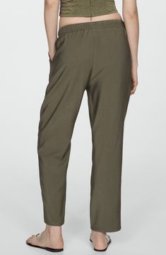 Look put-together but stay comfy in these flowy, high-rise, jogger-style trousers made with an elastic waist and relaxed straight legs. Elastic/drawstring waist Side slant pockets 93% viscose, 7% polyester Machine wash, line dry Imported Casual Viscose Long Pants, Casual Viscose Bottoms, Relaxed Fit Viscose Bottoms With Elastic Waistband, Casual Viscose High-waisted Pants, Casual High-waisted Viscose Pants, Viscose Bottoms With Elastic Waistband And Tapered Leg, Casual Loungewear Viscose Pants, Casual Viscose Straight Leg Bottoms, Casual Straight Viscose Pants