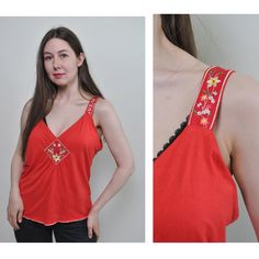 Check out this floral red tank top made of mixed synthetic fabric with flowers embroidery. Good choice for summer festival outfit. Great relaxed top for hippie vibe. Welcome to TARASCOMMON.ETSY.COM Unique clothing from the 20th century. Model tall - 170cm. Size: M. Width - 46cm / 18.11inch; Length - 60cm / 23.62inch. All measurements are taken seam to seam while lying flat. Viscose/ Elastan. This item is vintage, so it can have some defects. Additional photos can be send We are glad that you are Bohemian Tank Top With Floral Embroidery, Floral Embroidered Tank Top For Summer, Floral Embroidered Tank Top For Spring, Red Cotton Tank Top For Summer, Orange Camisole Tank Top For Spring, Red Summer Tank Top For Festivals, Red Retro Spring Tank Top, Spring Floral Embroidery Tank Top, Retro Red Spring Tank Top