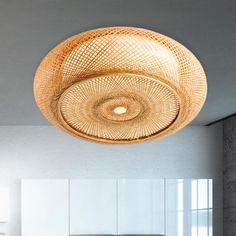 a large round light fixture hanging from the ceiling