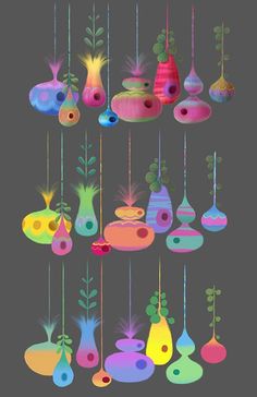 a bunch of different colored objects hanging from strings on a gray background with text that reads,