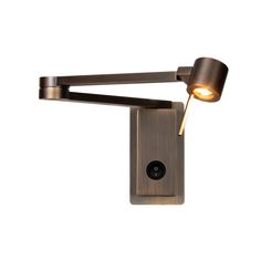 a light that is on the side of a wall mounted lamp with a camera attached to it