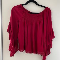 Ruffle Sleeves, Smocked Top. No Tags, Never Worn. Fits Like A Large Flowy Smocked Bodice Top For Fall, Flowy Ruffle Sleeve Top With Smocked Back, Flowy Tops With Smocked Back And Ruffle Sleeve, Flowy Fall Tops With Smocked Back, Red Ruffled Stretch Tops, Red Smocked Top With Ruffles For Summer, Red Stretch Ruffle Tops, Flowy Smocked Summer Blouse, Flowy Smocked Bodice Top For Day Out