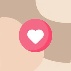 a pink button with a white heart on it's side in front of a beige background