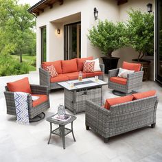 an outdoor living room with orange and gray furniture