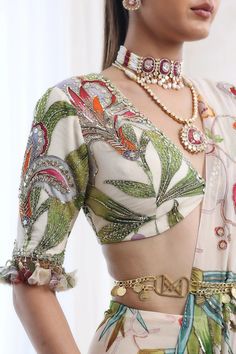 Pre-draped Saree And Embroidered Blouse With Belt And Drape. From Mahima Mahajan's Fida collection. DELIVERY TIMEPlease allow 6-8 weeks for your outfit to arrive. FABRIC DETAILSGeorgette, Organza Professional cleaning only. Luxury Saree With Latkans For Festivals, Luxury Saree With Latkans For Festive Occasions, Multicolor Floral Embroidery Blouse For Reception, Multicolor Embroidered Wedding Top, Multicolor Floral Embroidery Blouse Piece For Reception, Multicolor Saree Blouse For Reception, Elegant Georgette Blouse With Floral Print, Elegant Multicolor Blouse For Reception, Elegant Floral Print Georgette Blouse