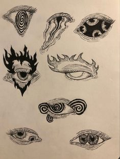 a drawing of different types of eyes and their designs on white paper with black ink