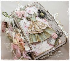 altered photograph of an old suitcase with lace and flowers