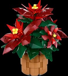 a lego plant with red and green flowers in it's centerpieces on a black background