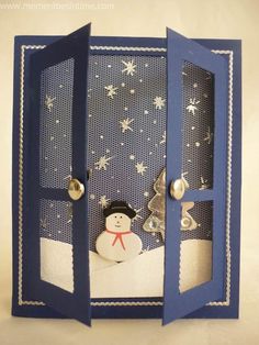 an open door with a snowman inside