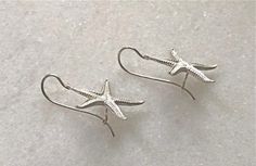 These beautiful, high quality sterling silver earrings look so realistic that you can almost hear the waves unrolling on a nearby beach. They look so much like starfish because they were hand cast from molds created from the shapes of a real creature. These eye-catching earrings were handcrafted by artists in Sardinia specifically selected to convey the KOKKU vision of "preserving by promoting" traditional artisan crafts by giving them a new life and personal meaning to people around the world. Sea Star, Earrings Large, Hand Cast, Large Earrings, Artisan Craft, Sardinia, People Around The World, Pierced Ears, Starfish