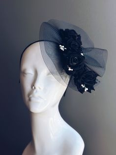 This all-black headpiece features elegant black roses set against a fine black mesh. Perfect for adding a touch of sophistication to any special occasion Age Group/Gender - Adult/Women Size/Type - One size fits all adults Color - black Special Features - Black roses and white buds Elegant Black Party Veil, Black Costume Hats For Kentucky Derby Wedding, Black Fitted Fascinator For Evening, Fitted Black Fascinator For Evening, Black Kentucky Derby Costume Hat, Black Headpieces For Spring Party, Black Event Headband, Fitted Black Headpiece For Races, Fitted Black Headpiece For Evening