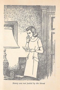 a woman in an apron is talking on the phone while standing next to a lamp