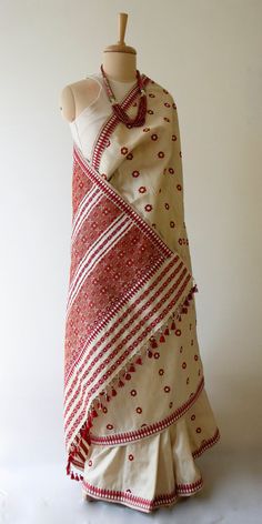 "This is a Handloom, Hundred Percent Pure Muga Silk by Mulberry Silk Saree from the looms of ASSAM. The motifs are in Acrylic. Muga Silk - The most valued silk from India. Almost exclusively reared and produced in Assam, India. It is indigenous to the Brahmaputra Valley and assiduously practiced in the districts of Assam. The moth is basically a wild moth. Hence it is categorised as Vanya Silk or Wild silk by the silk board of India.(http://csb.gov.in/silk-sericulture/silk/vanya-silk/) The yarn Luxury Handloom Tussar Silk Pashmina Shawl, Mekhala Saree, Mulberry Silk Saree, Festive Folk Style Traditional Wear Handloom, Folk Style Dupatta With Woven Motifs, Folk Style Handloom Dupatta For Festivals, Festive Folk Traditional Wear From Handloom, Festive Folk Handloom Traditional Wear, Folk Traditional Wear With Woven Motifs For Festive Occasions