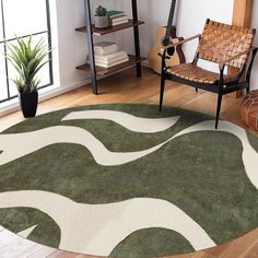 a green and white rug in the corner of a room with a guitar on it