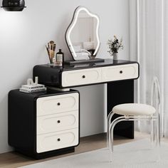 a black and white desk with a mirror, stool and chair in front of it