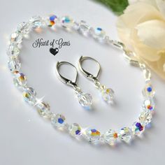 Bracelet and earring set are made of pure crystal beads with an aurora borealis affect. Daughter Ring, Pearl Bangle Bracelet, Bracelet And Earring Set, Crystal Anklet, Beautiful Anklet, Accessories Boho, Swarovski Crystal Jewelry, Swarovski Crystal Bracelet, Basic Jewelry