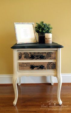 an old dresser has been painted with black and white stripes, which are used as a side table