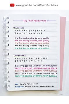 a spiral notebook with some type of writing on it and the words in different languages