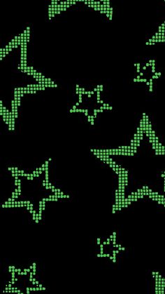 an image of green stars on black background